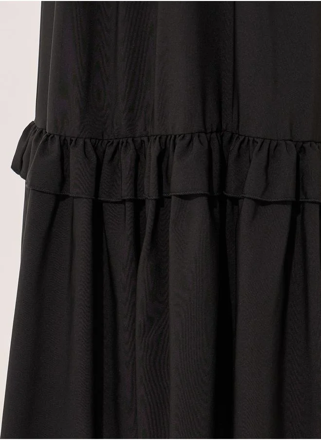 Styli Solid Ruffled Hem A-Line Maxi Skirt
