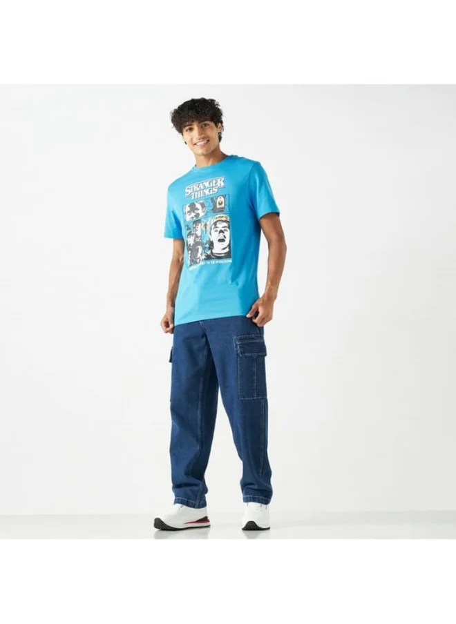 SP Characters Graphic Print T-shirt with Crew Neck and Short Sleeves