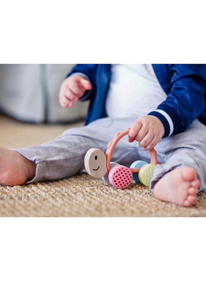 هيب لعبة سلحفاة تيربو من هابي للتسنين والدفع بمقبض سيليكون آمن للمضغ وعجلات بنقوش ملونة لتنمية المهارات الحركية والاجتماعية للأطفال من عمر  أشهر فما فوق - Image 5