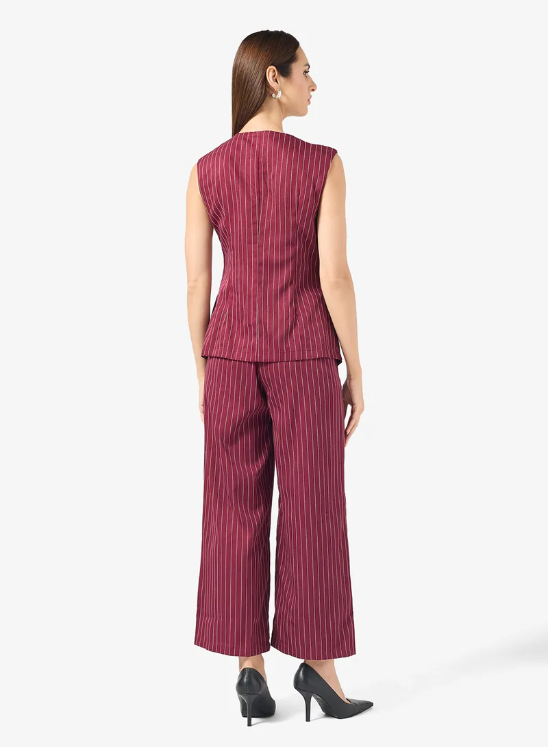 ايلا طقم سترة وبنطلون مخطط