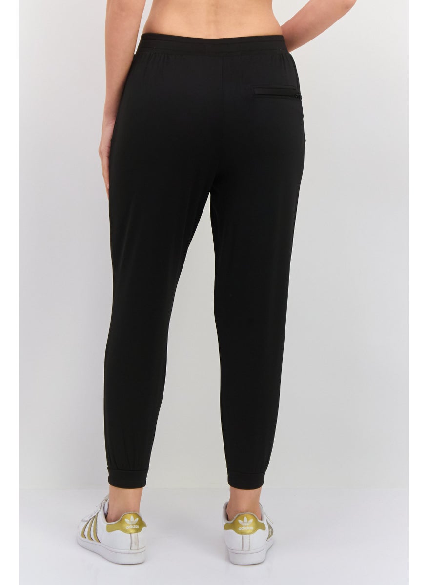 Women Regular Fit Solid Jogger Pants, Black - pzsku/ZAFF0AFFB84C55E5ED5E1Z/45/_/1737642595/a7e39447-94fd-418d-a304-96df057a298a