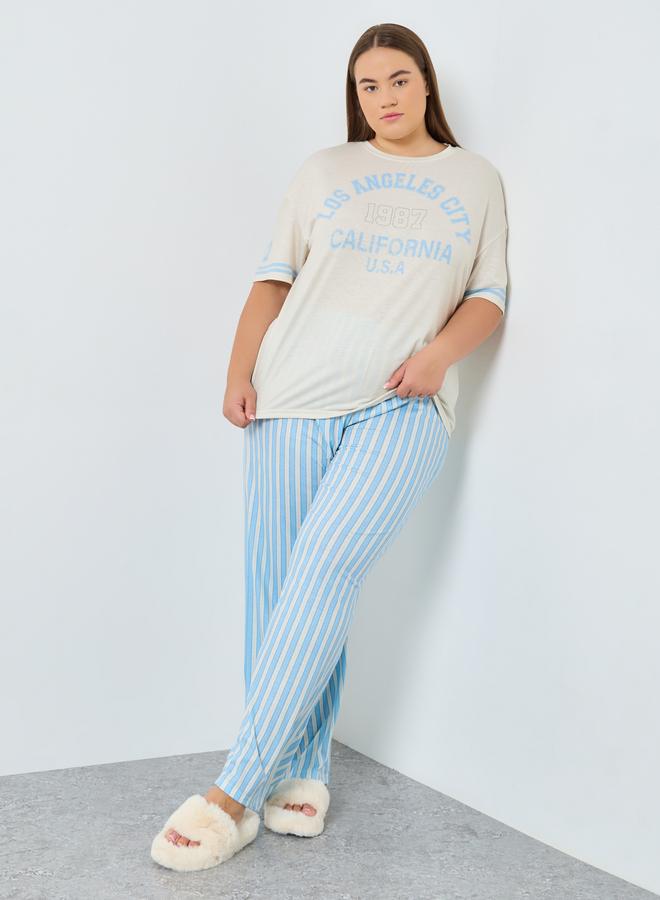 ستايلي طقم من بنطال بيجاما بمقاس كبير وتيشيرت مخطط - Image 1