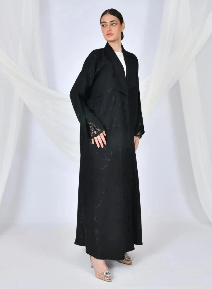 lamha abaya Black abaya wrapped in summer jacquard fabric with elegant ribbon overlap on the sleeves