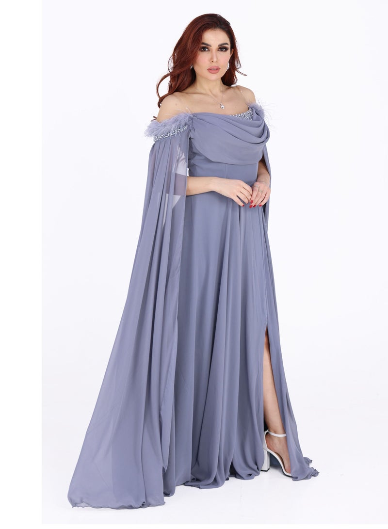 مودرن ديزاين فستان سهرة طويل من خامة الشيفون بأكمام طويلة مطرز بحبات الكريستال على الصدر ويتميز بريش في اعلى الصدر يعطيك تميز واناقة عن كل من حولك - Image 1