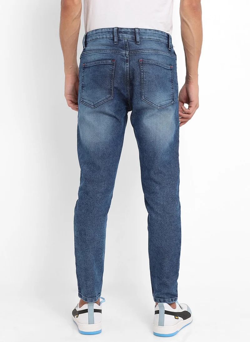 Campus Sutra Campus Sutra Men's Blue Distressed Patterned Denim Jeans For Everyday Wear | Medium-Wash |  Button Closure | Regular Fit | Denim Jeans Crafted With Comfort Fit For Everyday Wear