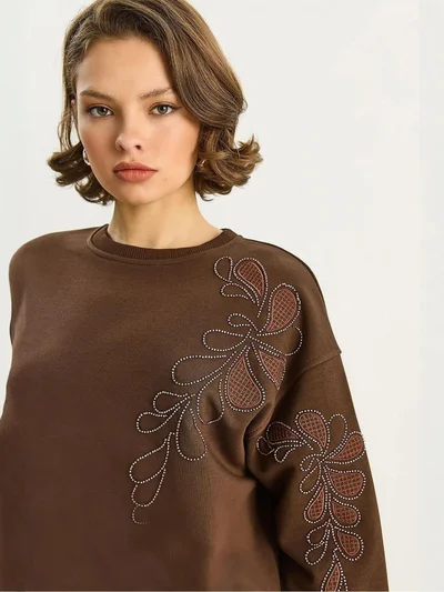 بيانكو لوتشي سويت شيرت بأكمام طويلة وياقة دائرية مطرز من لوتشي