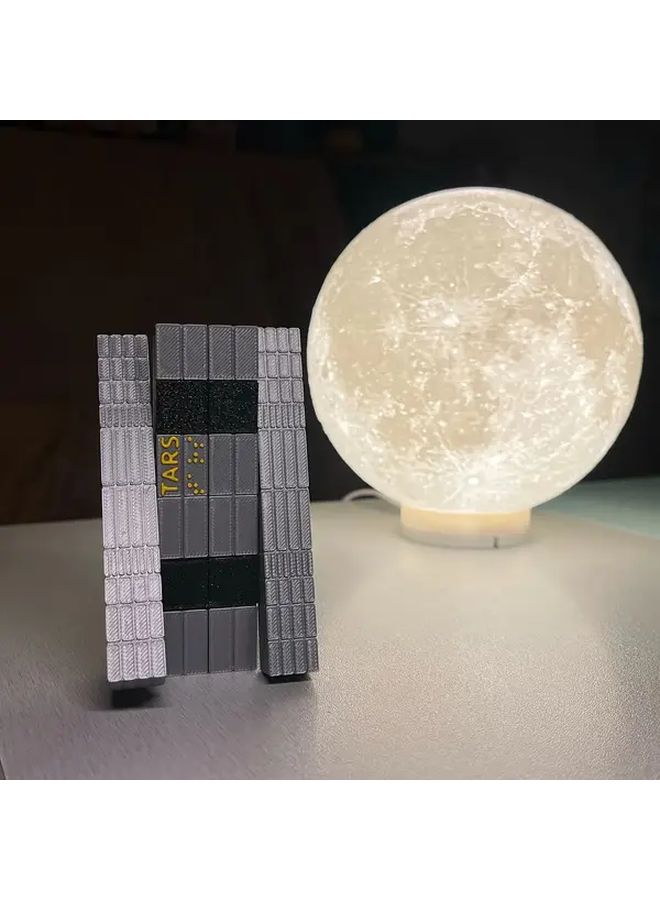 Silver TARS Robot Collectible Model Glowing Orange Eyes Durable Plastic Indoor Outdoor Display - Image 1