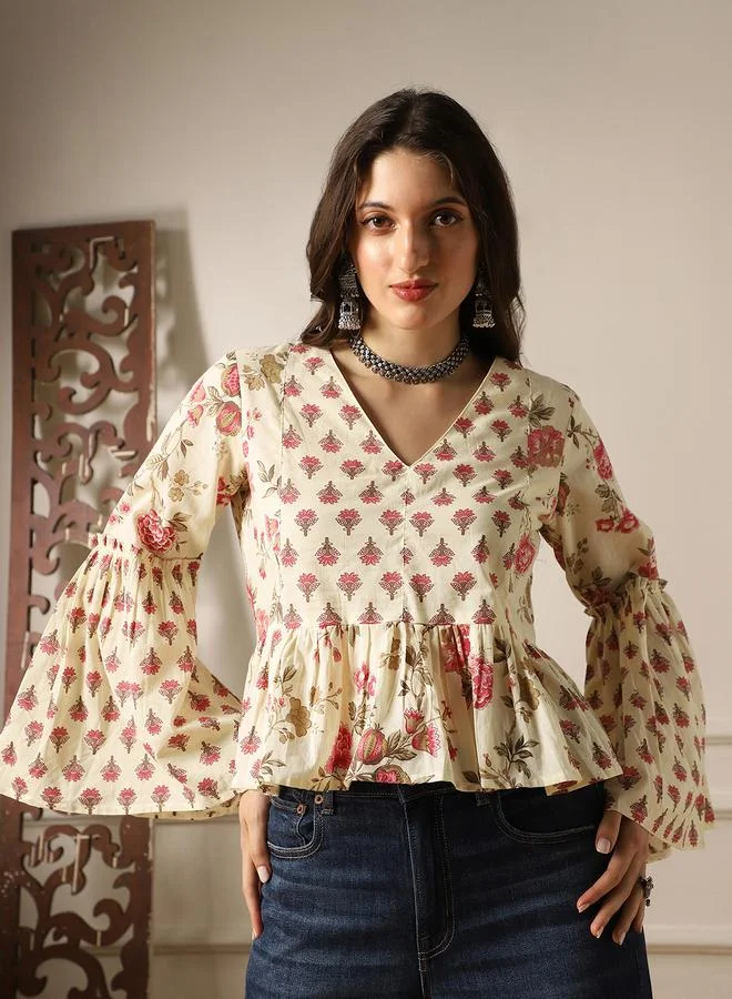 جلو باص تونيك بيبلوم بطبعة زهور وأكمام جرس