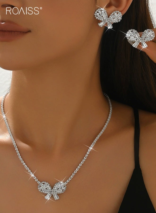 رويس طقم مجوهرات رائع من قطعتين على شكل فيونكة من الكريستال، وقلادة سلسلة تنس مرصعة بأحجار الراين وأقراط مرصعة بالمسامير، وقلادة على شكل فيونكة من الكريستال العتيق، وقلادة تشوكر وأقراط أذن، ومجموعات مجوهرات لحفلات الزفاف والحفلات الراقصة للنساء - Image 1