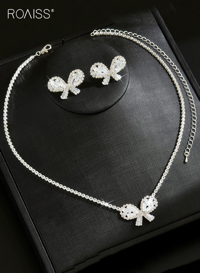 رويس طقم مجوهرات رائع من قطعتين على شكل فيونكة من الكريستال، وقلادة سلسلة تنس مرصعة بأحجار الراين وأقراط مرصعة بالمسامير، وقلادة على شكل فيونكة من الكريستال العتيق، وقلادة تشوكر وأقراط أذن، ومجموعات مجوهرات لحفلات الزفاف والحفلات الراقصة للنساء - Image 2