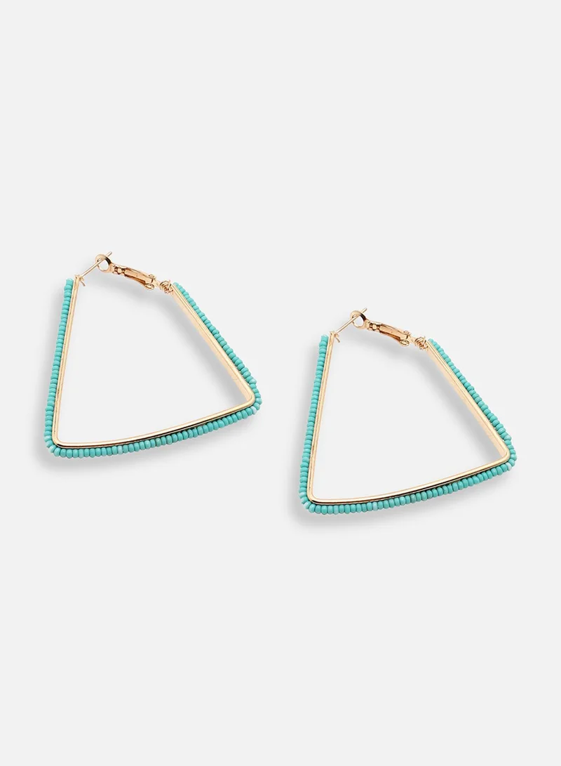 سوهي حلق مطلي بالذهب مصمم للحفلات