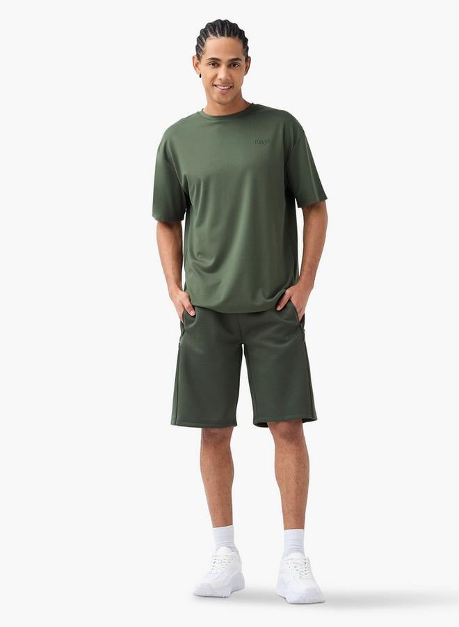 كابا تيشيرت بياقة ضيّقة وأكمام قصيرة وشعار من كابا - Image 2