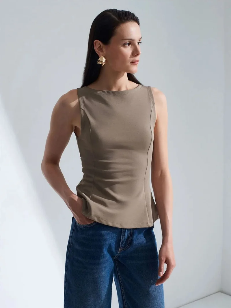 ديلفين DILVIN Fitted Sleeveless Peplum Blouse