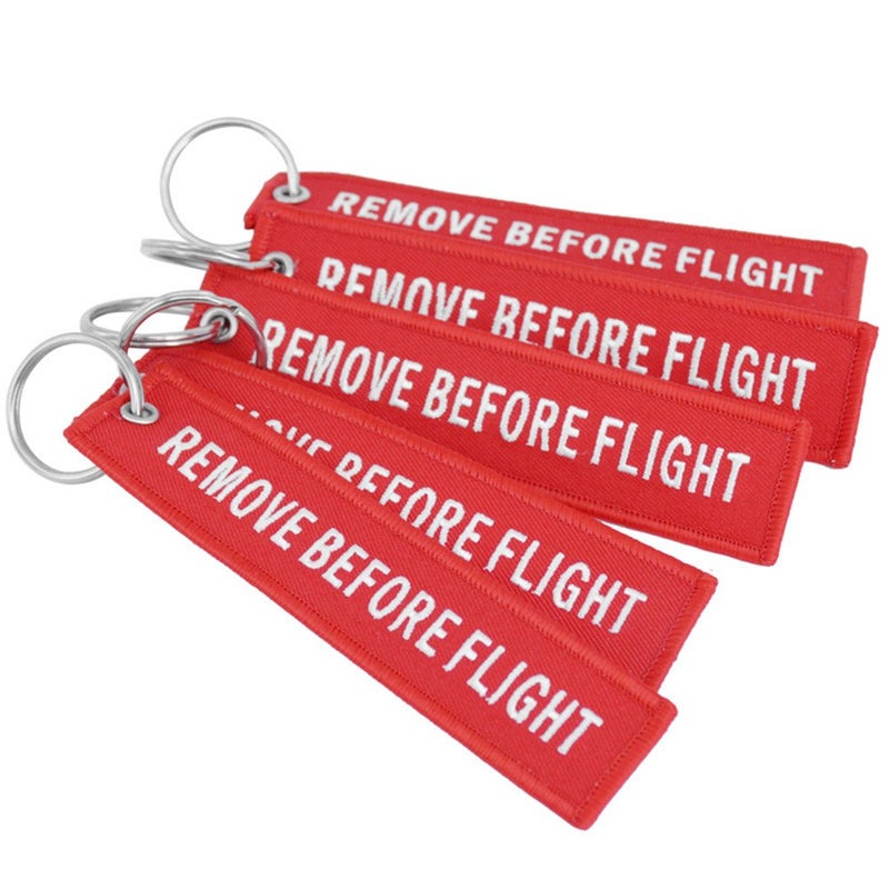 "REMOVE BEFORE FLIGHT" Embroidered keychain pendant - Image 1
