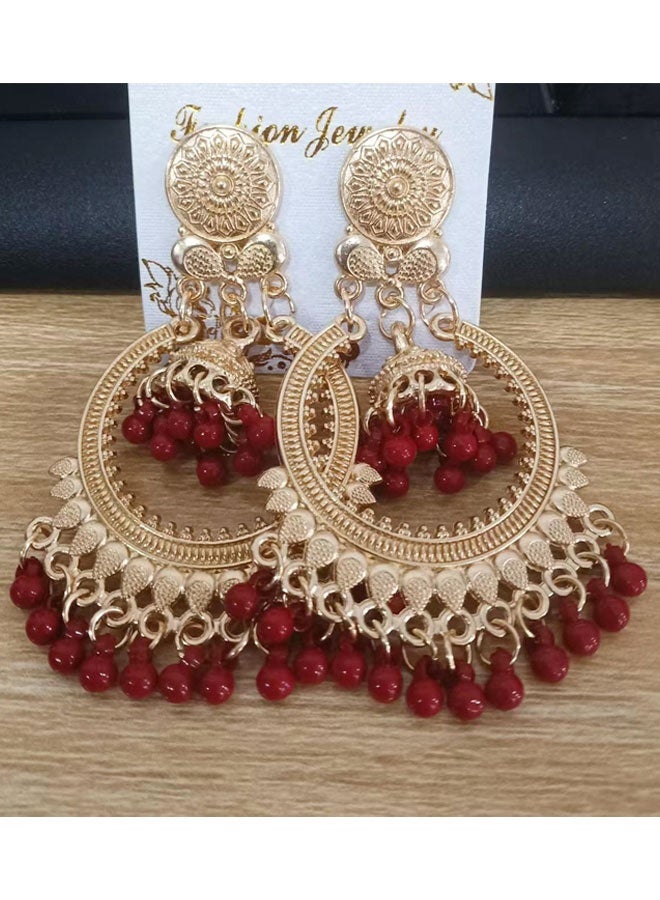 حلق جومكا لنساء - حلق تقليدي هندسي ذهبي مطلع مع حبات حمراء، اكسسوار راقٍ للمهرجانات والزواج