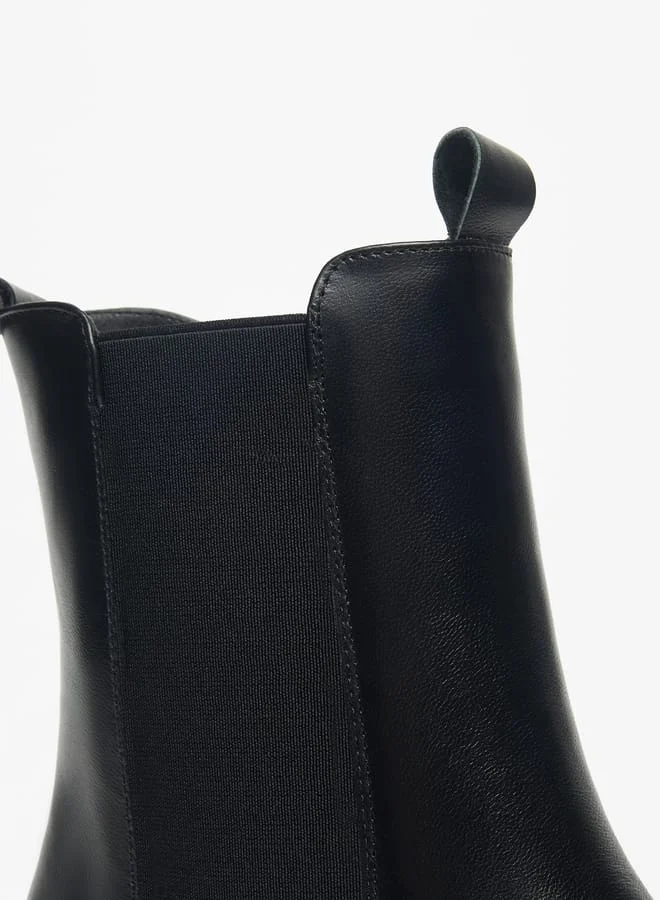 Celeste Womens Solid Boots with Zip Closure