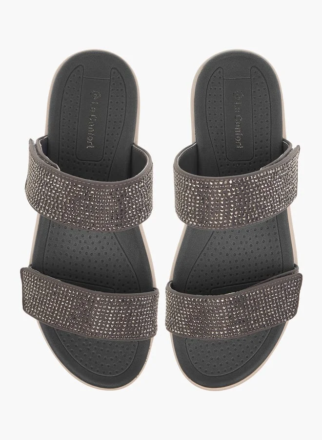 لو كونفورت صنادل نسائية مسطحة مزينة بنعل سميك