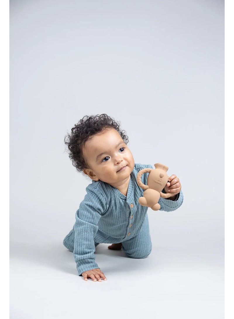 Pippeta The Pippeta Albert Bear Baby Teether is designed to comfort and soothe babies during their early teething stages. Crafted from 100% natural rubber, it is soft, flexible, and gentle on delicate gums, making it safe from birth. Its easy-to-hold shape supports small hands as babies begin to explore and self-soothe. The sensory design encourages early developmental play, helping stimulate curiosity and coordination. Finished with a hand-painted touch, it combines safety, functionality, and charm in one thoughtfully designed teething companion. - Image 2