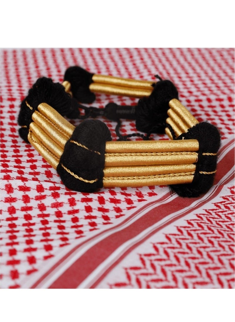 Generic - King Faisal's distinctive headband in a unique way to participate in the Saudi 6th Day - Image 1