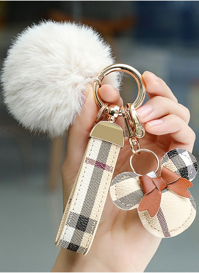 KeyAmor - Elegant metal and plaid leather keychain set with a fluffy faux fur pom-pom and Mickey charm. Stylish keychain for women, featuring golden accents and multiple key rings for functionality. Includes a plaid leather strap and matching accessories, making it a perfect gift choice. - Image 1