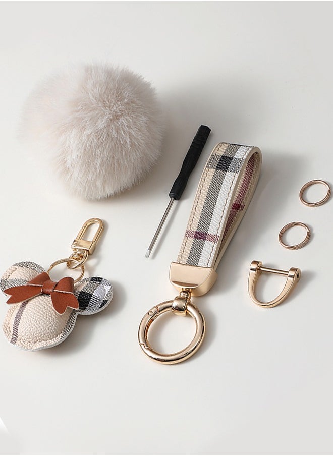 KeyAmor - Elegant metal and plaid leather keychain set with a fluffy faux fur pom-pom and Mickey charm. Stylish keychain for women, featuring golden accents and multiple key rings for functionality. Includes a plaid leather strap and matching accessories, making it a perfect gift choice. - Image 1