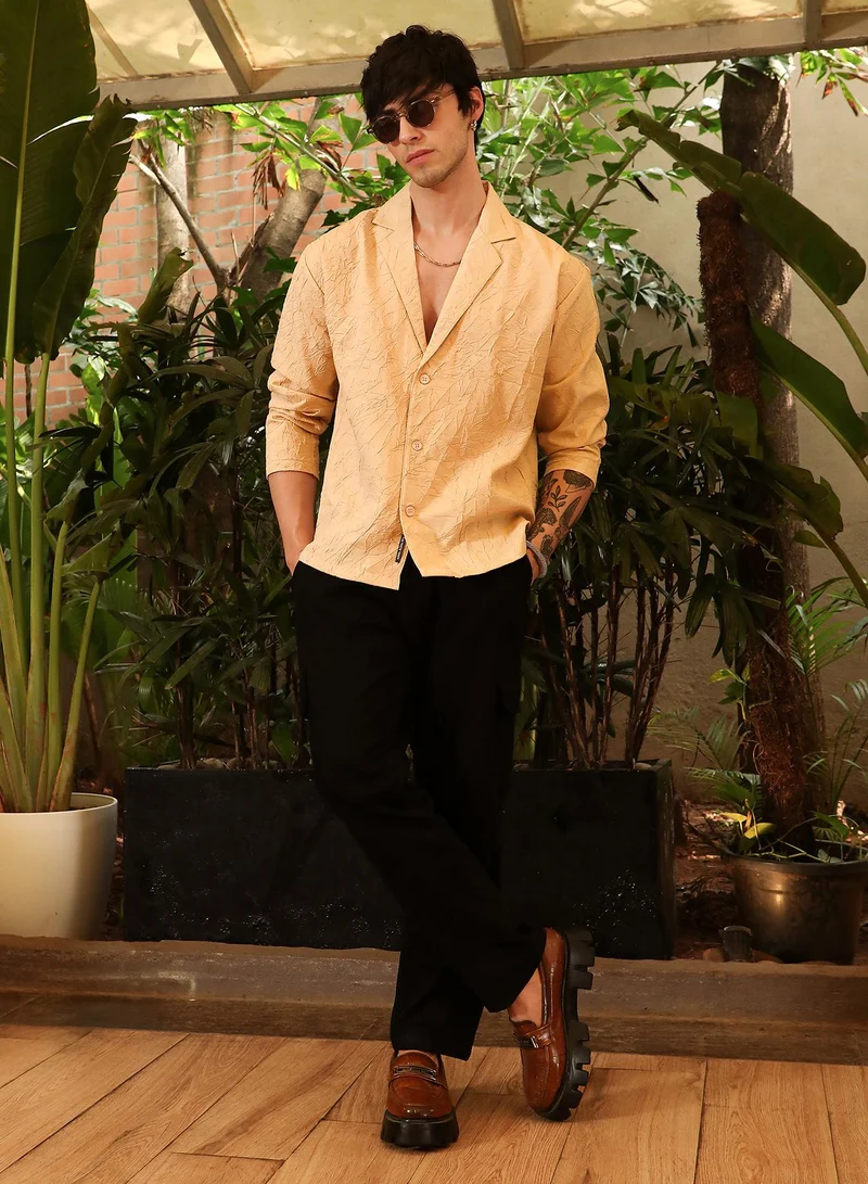 Campus Sutra Campus Sutra Men's Buff Beige Wrinked Korean Oversized Shirt For Casual Wear | Lapel Collar | Long Sleeve | Button Closure | Oversized Shirt Crafted With Comfort Fit For Everyday Wear
