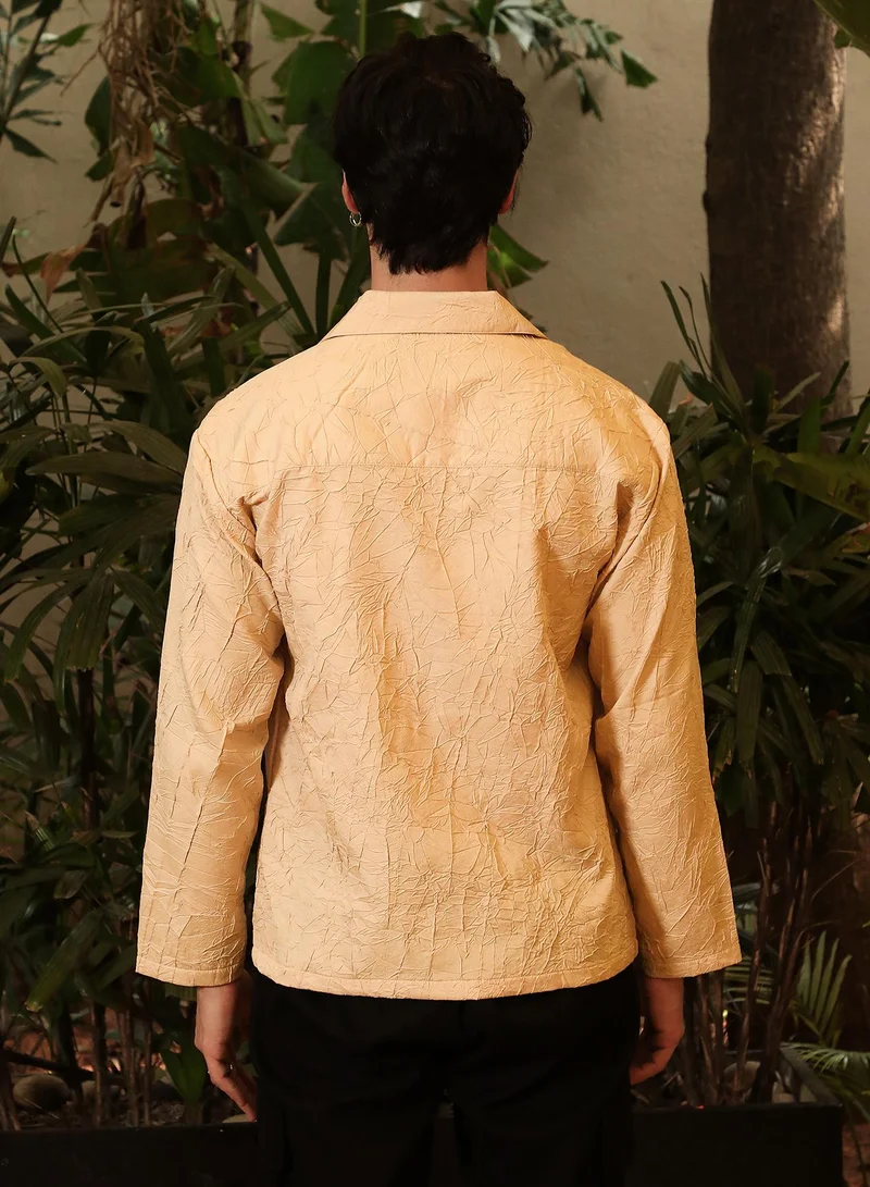 Campus Sutra Campus Sutra Men's Buff Beige Wrinked Korean Oversized Shirt For Casual Wear | Lapel Collar | Long Sleeve | Button Closure | Oversized Shirt Crafted With Comfort Fit For Everyday Wear