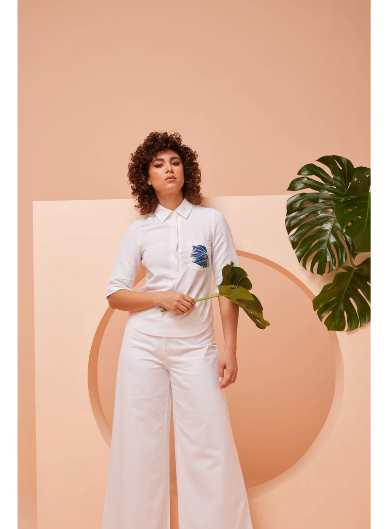 Ashita Fernandes  Embroidered Pocket Detail Cotton Polo Shirt for Women | Best Price UAE