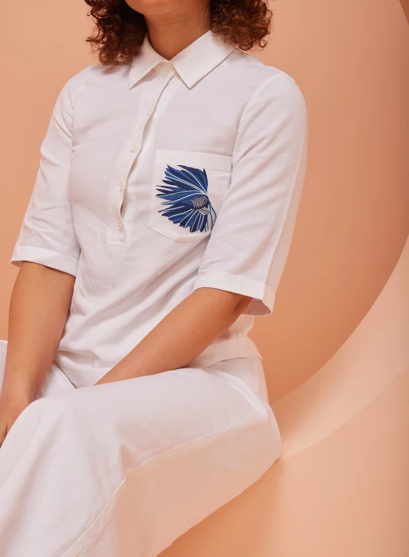 Ashita Fernandes  Embroidered Pocket Detail Cotton Polo Shirt for Women | Best Price UAE