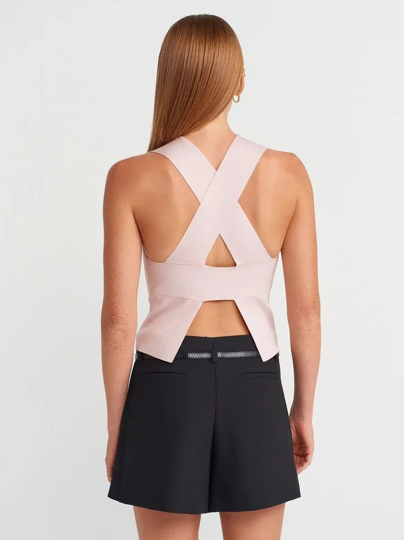 ديلفين Dilvin Sleeveless Cut-Out Knit Blouse