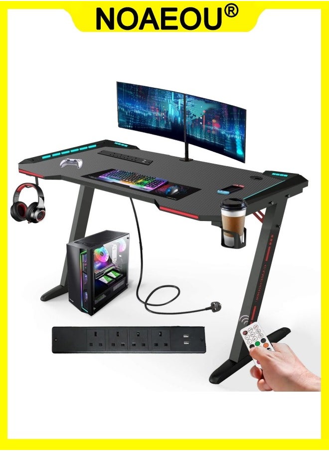 NOAEOU - 140cm×60cm Z-Shaped Gaming Desk with 4 AC Outlets and RGB Lighting, Large PC Table Includes Big Mouse Pad, Cup Holder and Headset Hook - Image 1
