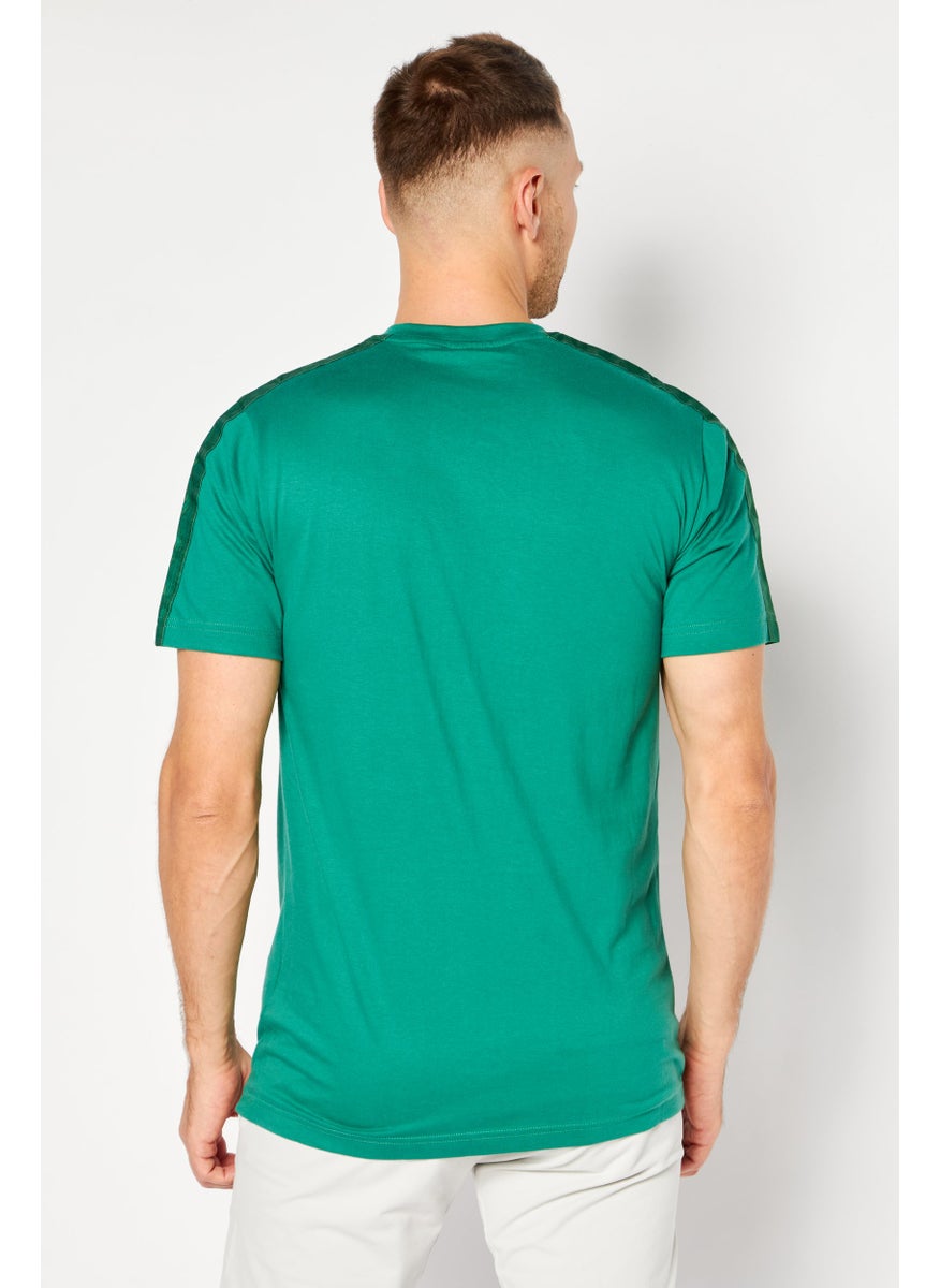 umbro - Men Sportswear Fit Short Sleeve Brand Logo T-Shirt, Green - Image 1