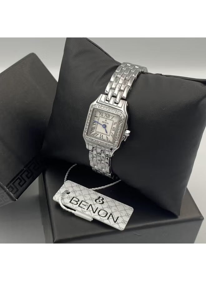 Modern, high-quality women's stainless steel wristwatch with a water-resistant finish, silver strap, and white dial.