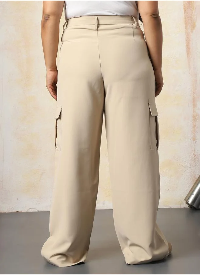 هاي ستار Women Trousers in Beige featuring Wide Leg fit with a solid pattern, regular length, secured with button closure, crafted from 95% polyester 5% spandex – crafted for those who appreciate style and comfort.