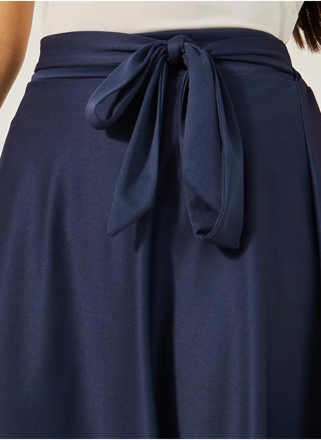 Styli High Rise A-Line Midi Skirt with Tie-Up Belt Detail