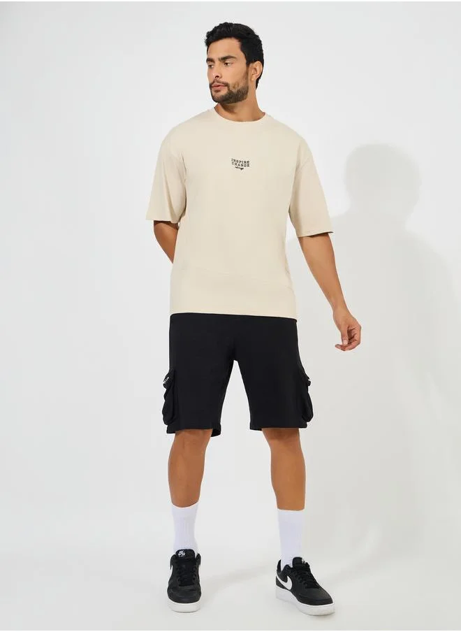 ستايلي Styli Cut and Sew Oversized T-Shirt with Contrast Embroidery