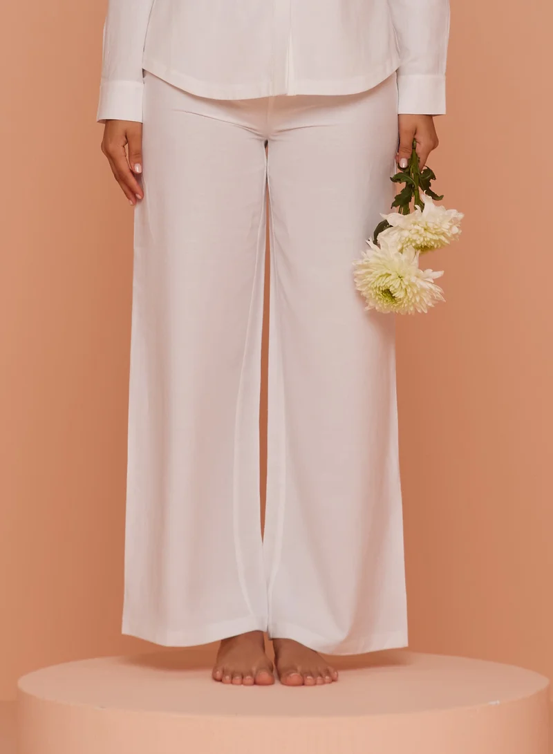أشيتا فرنانديز High-Waisted Wide-Leg Ankle Pants