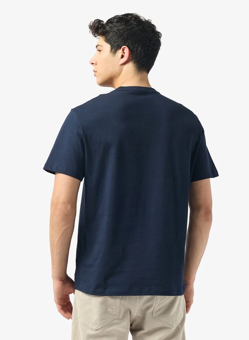 كالفن كلاين تيشيرت بياقة دائرية برسومات