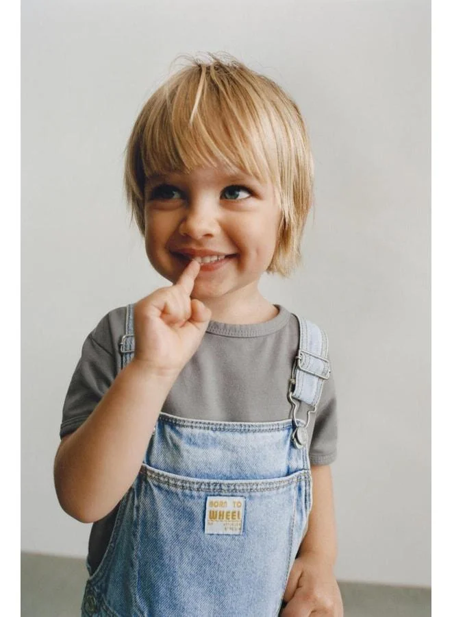 Magu Unisex Kids Light Blue Denim Short Overalls with Pockets - Adjustable Straps.
