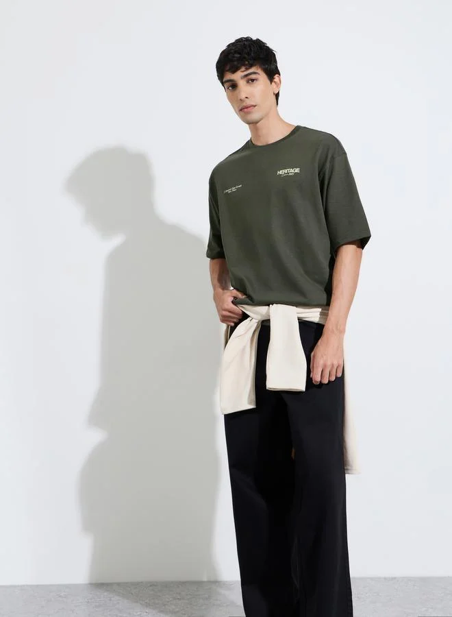 Styli Olive Green Slogan Print Crew Neck Oversized T-Shirt