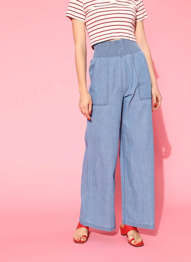 ساسافراس Stunning Blue Solid Elevated Bottom Trousers for Women