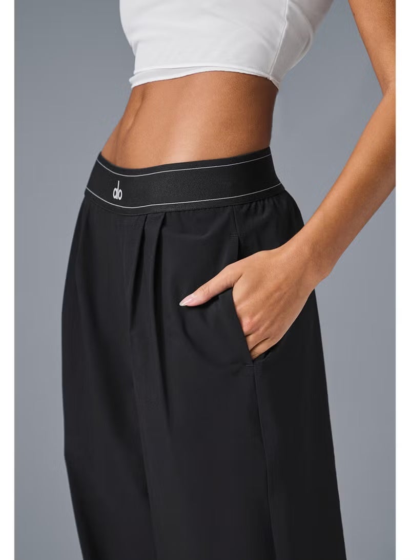 ألو ALO اليوغا 30 Inseam بدلة حتى بنطلون، بانتظام تناسب واسع الساق بنطلون للنساء (مصممة للارتفاعات 5'7 تحت) - أسود - Image 1