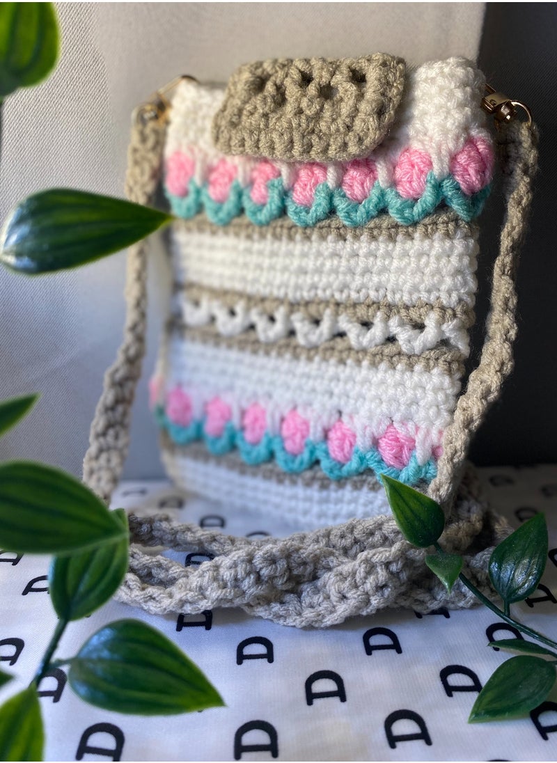 Crochet made Tulip Pattern Mobile Sling Bag - pzsku/ZB0A263AADDC9453C0074Z/45/_/1698152020/b234f53b-9bc2-4310-a811-a98f064af6b9