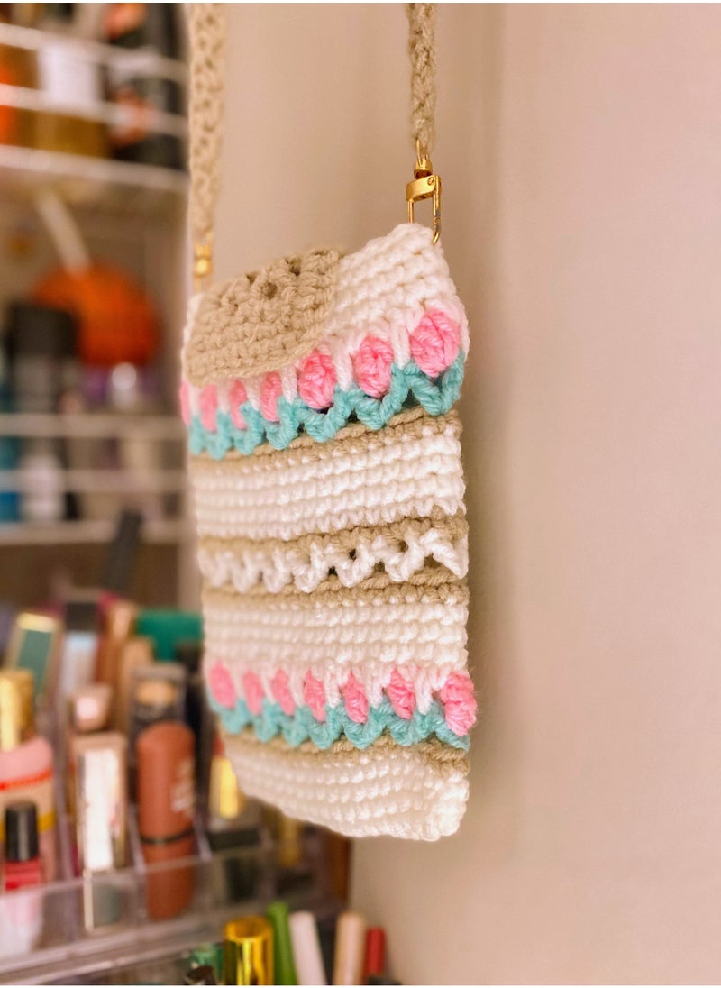 Crochet made Tulip Pattern Mobile Sling Bag - pzsku/ZB0A263AADDC9453C0074Z/45/_/1698152081/0a4b46f6-cacf-47c2-a3fb-1f88aa99f0c0