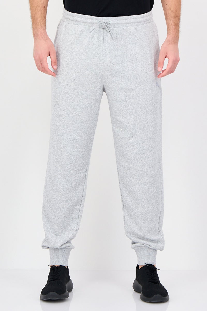 PUMA Men Sportswear Fit Brand Logo Outdoor Sweatpants, Heather Grey - Image 1