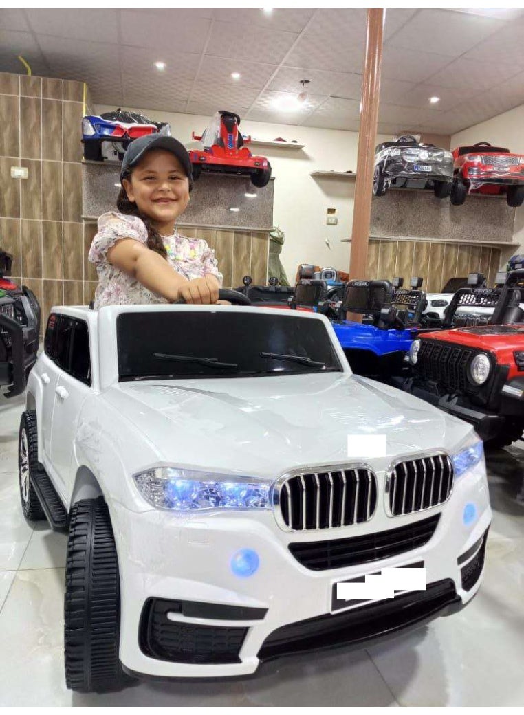 سيارة أطفال كهربائية بتصميم جذاب للأطفال 12V – بمقعدين مع أصوات وشيلات - Image 1