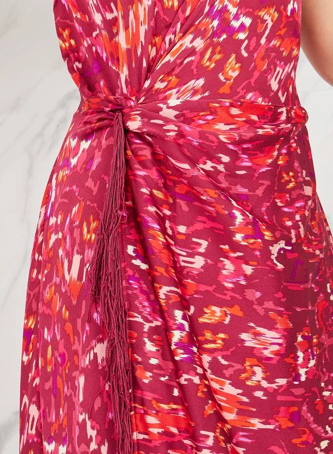 ستايلي Ikat Print Halter Neck Wrap Style Maxi Dress with Tassel Detail