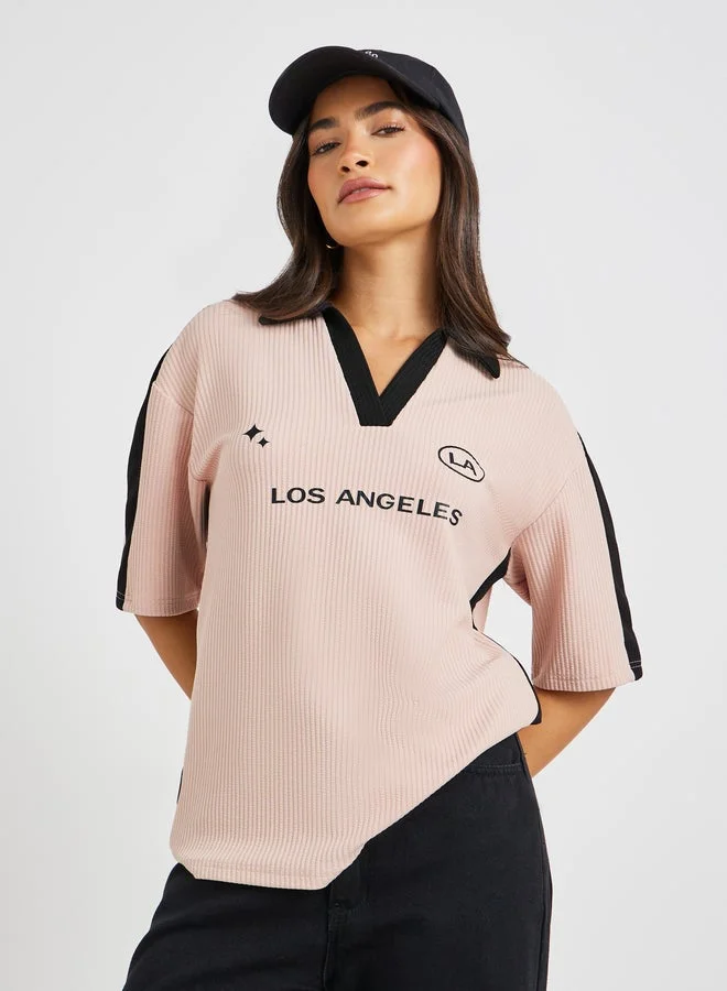 Styli Slogan Print Short Sleeve Collared Oversized T-Shirt