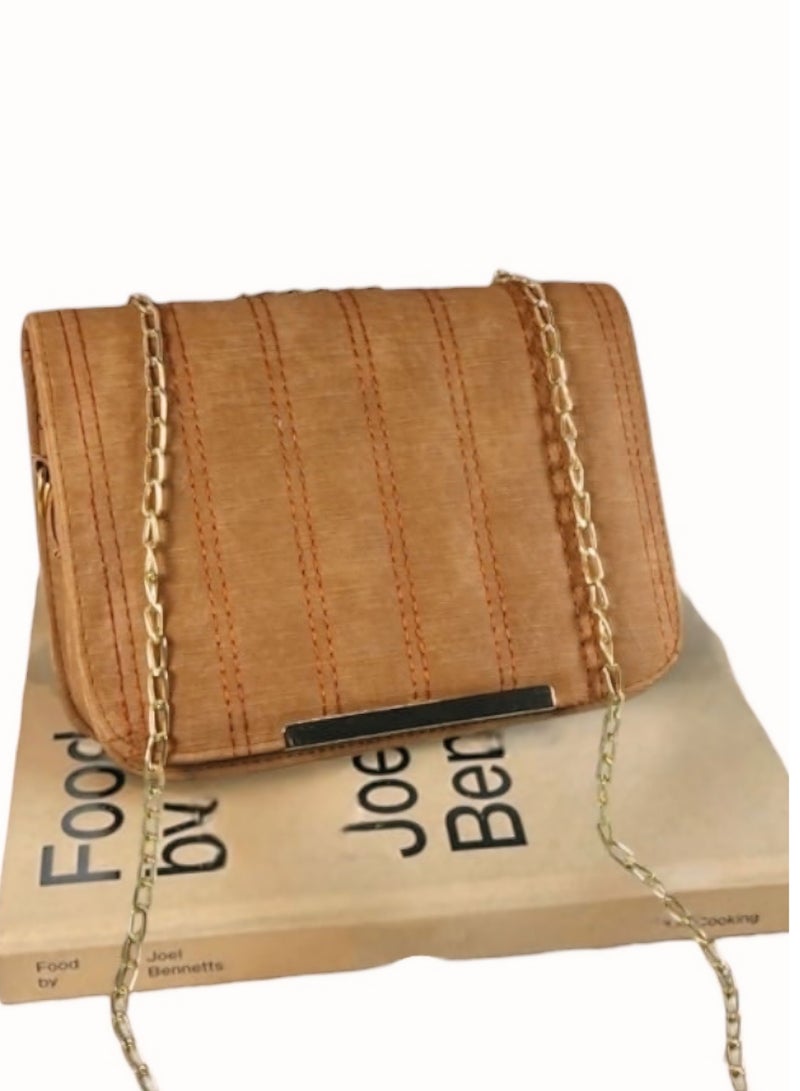 A havan imported leather crossbody bag with elegant details and practical compartments. - Image 1