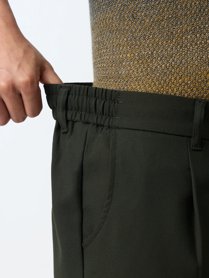 The Souled Store  The Souled Store Straight Pleated Pants: Carbon Men and Boys Dark Olive Green Solid Polyester Viscose Elastane Blend Straight Fit 4-Way Stretch Wrinkle-Free Trousers  | Best Price UAE